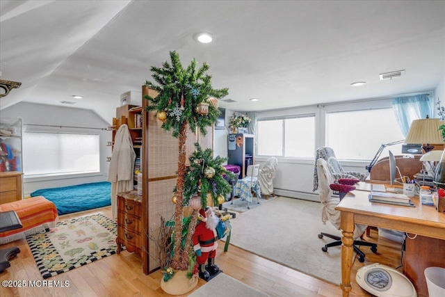 57 Shore Dr, Highlands, NJ 07732 - office with healthy amount of natural light, baseboard heating, wood finished floors, and vaulted ceiling