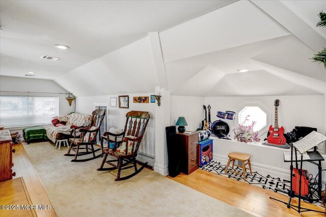 57 Shore Dr, Highlands, NJ 07732 - living area with lofted ceiling, wood finished floors, and recessed lighting