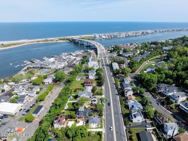 57 Shore Dr, Highlands, NJ 07732 - aerial view of property and surrounding area with a nearby body of water, a notable bridge, and nearby suburban area