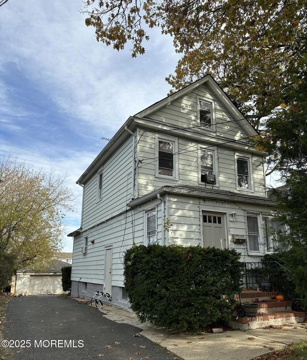 view of front of property featuring cooling unit