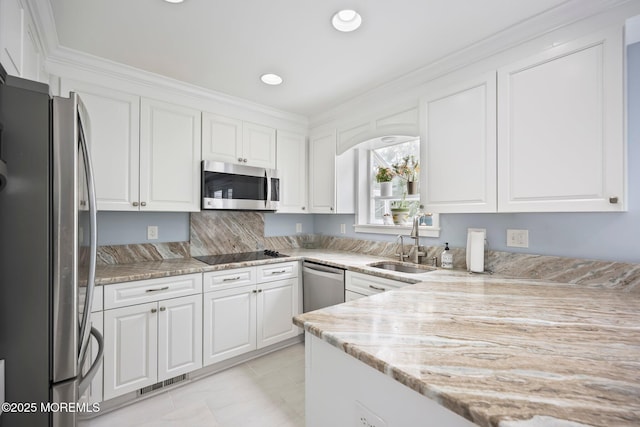 7 Colonial Ct, Manalapan, NJ 07726 - kitchen featuring appliances with stainless steel finishes, a sink, white cabinets, light stone countertops, and recessed lighting