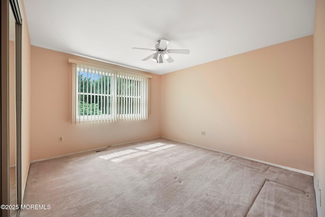 7 Colonial Ct, Manalapan, NJ 07726 - carpeted empty room featuring a ceiling fan and baseboards