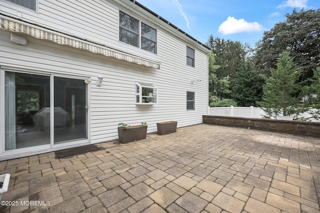 7 Colonial Ct, Manalapan, NJ 07726 - view of patio featuring fence