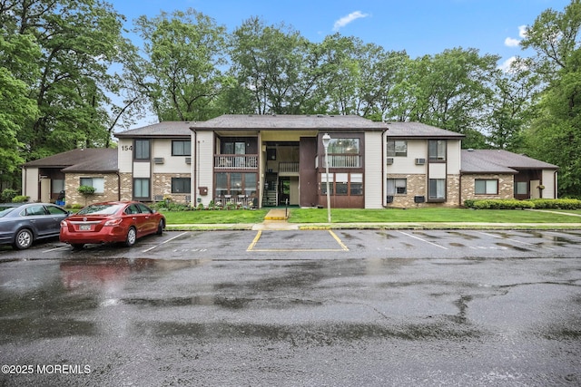 154 Cross Slope Ct Unit J, Manalapan, NJ 07726 - view of property featuring uncovered parking