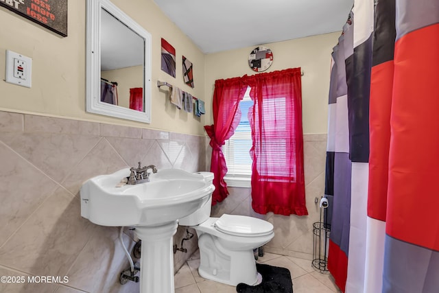 430 Myrtle Ave, Neptune Township, NJ 07753 - full bath with tile walls, tile patterned flooring, wainscoting, and toilet