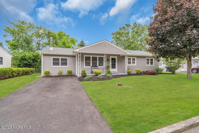 726 Hardean Rd, Brick, NJ 08724 - ranch-style home with a front yard, driveway, covered porch, and roof with shingles