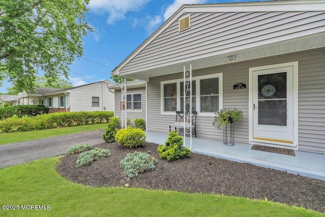 726 Hardean Rd, Brick, NJ 08724 - view of exterior entry with a porch