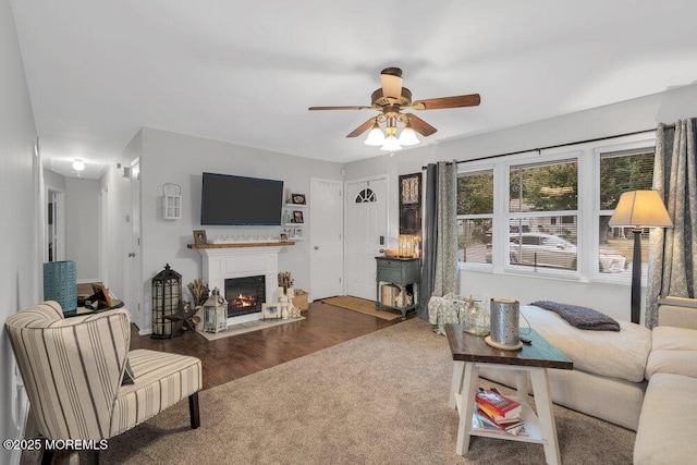 726 Hardean Rd, Brick, NJ 08724 - living area featuring a ceiling fan, a fireplace with flush hearth, and wood finished floors