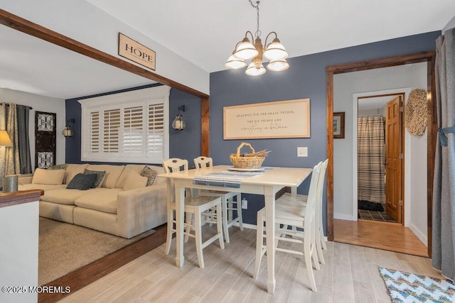 726 Hardean Rd, Brick, NJ 08724 - dining area featuring a chandelier, light wood finished floors, and baseboards