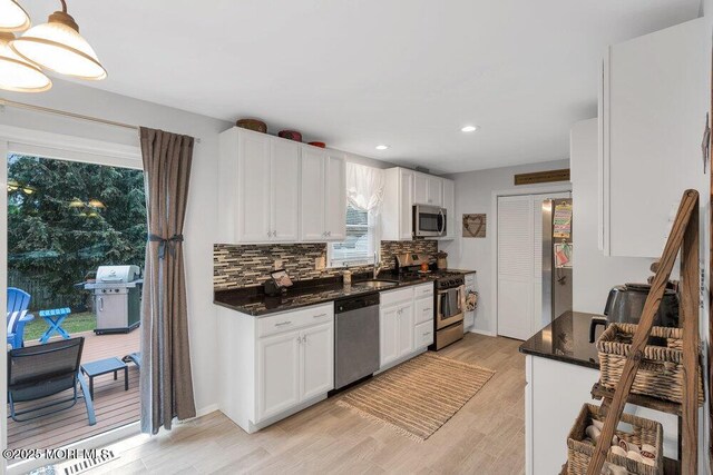726 Hardean Rd, Brick, NJ 08724 - kitchen featuring stainless steel appliances, white cabinets, tasteful backsplash, recessed lighting, and light wood-style floors