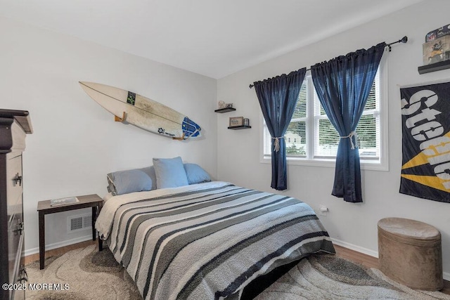 726 Hardean Rd, Brick, NJ 08724 - bedroom featuring wood finished floors and baseboards