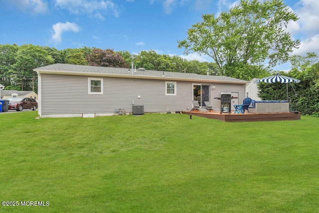 726 Hardean Rd, Brick, NJ 08724 - rear view of house with a wooden deck, central AC unit, and a yard