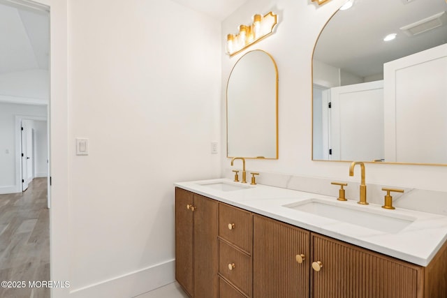 1 Foggia Way, Oceanport, NJ 07757 - full bathroom with double vanity, baseboards, and wood finished floors