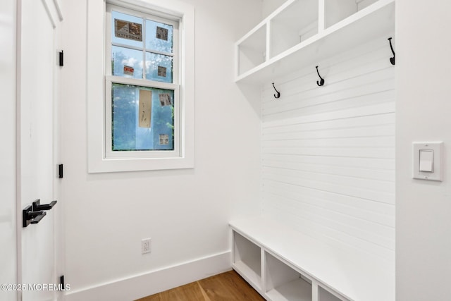 mudroom featuring baseboards and light wood-type flooring