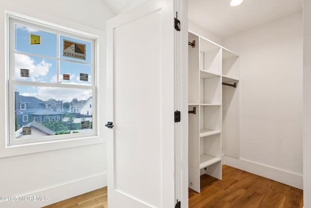 spacious closet with light wood-style flooring
