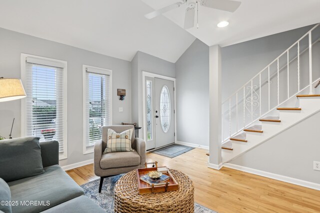 25 Meadow Ave Unit 30, Monmouth Beach, NJ 07750 - foyer featuring baseboards, wood finished floors, a ceiling fan, stairs, and vaulted ceiling