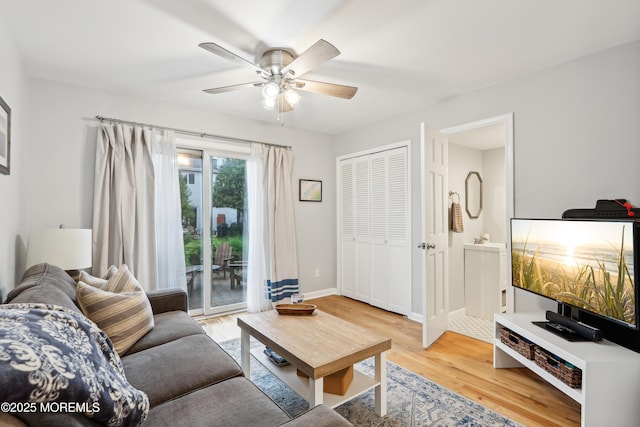 25 Meadow Ave Unit 30, Monmouth Beach, NJ 07750 - living room featuring wood finished floors, ceiling fan, and baseboards