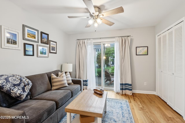 25 Meadow Ave Unit 30, Monmouth Beach, NJ 07750 - living room featuring light wood-style floors, a ceiling fan, and baseboards