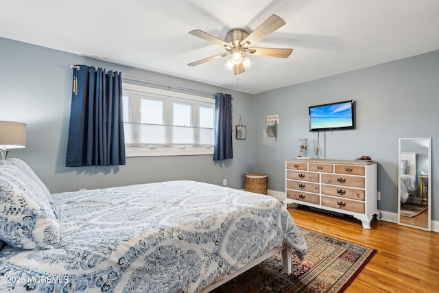 25 Meadow Ave Unit 30, Monmouth Beach, NJ 07750 - bedroom featuring wood finished floors, baseboards, and a ceiling fan