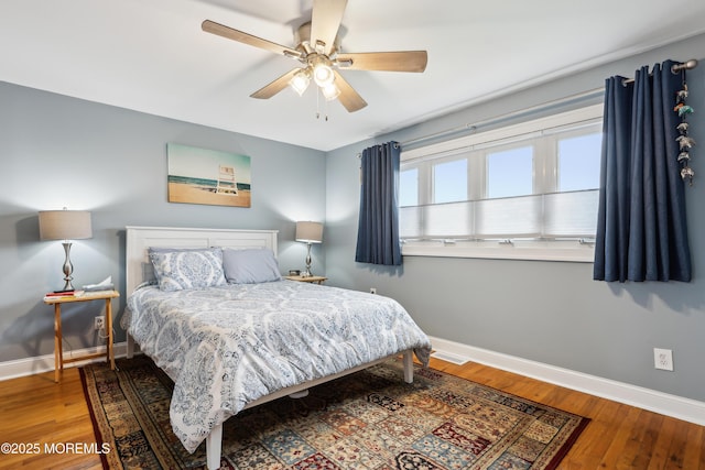 25 Meadow Ave Unit 30, Monmouth Beach, NJ 07750 - bedroom featuring baseboards, wood finished floors, and ceiling fan