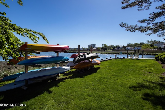 25 Meadow Ave Unit 30, Monmouth Beach, NJ 07750 - dock with a lawn and a water view