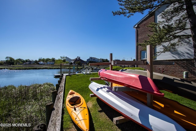 25 Meadow Ave Unit 30, Monmouth Beach, NJ 07750 - dock featuring a water view and a lawn