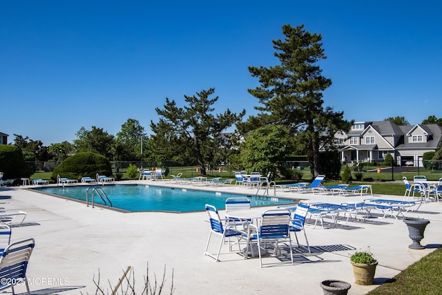 25 Meadow Ave Unit 30, Monmouth Beach, NJ 07750 - community pool with a patio and fence