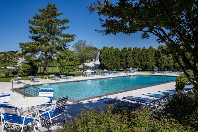 25 Meadow Ave Unit 30, Monmouth Beach, NJ 07750 - community pool with a patio and fence