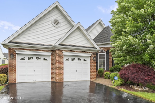 6 Beth Page Dr, Monroe, NJ 08831 - traditional-style home with asphalt driveway, brick siding, a garage, and roof with shingles