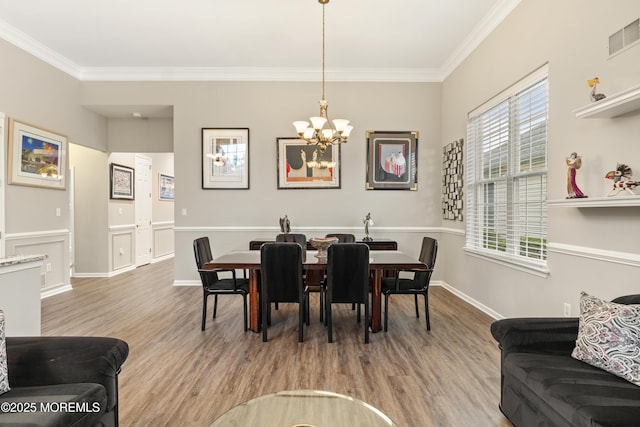 6 Beth Page Dr, Monroe, NJ 08831 - dining area with a chandelier, ornamental molding, light wood-style flooring, and baseboards