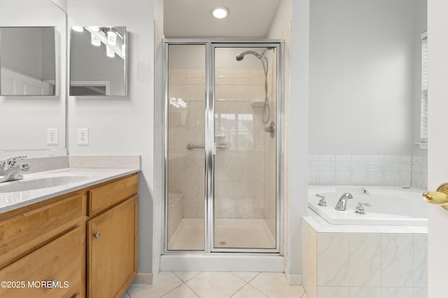 6 Beth Page Dr, Monroe, NJ 08831 - bathroom with tile patterned floors, a shower stall, a garden tub, and vanity