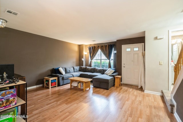 17 Canidae Ct, Tinton Falls, NJ 07753 - living area featuring light wood-style flooring, baseboards, and stairs