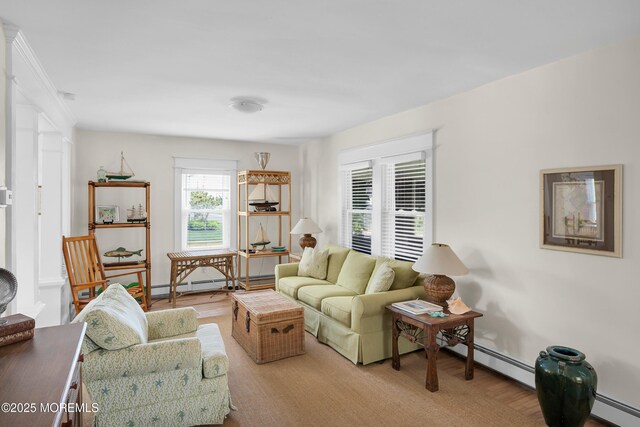400 W Lake Ave, Bay Head, NJ 08742 - living area with baseboard heating, wood finished floors, and baseboards