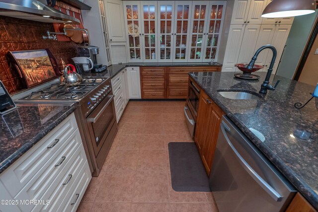 12 Hickory Dr, East Brunswick, NJ 08816 - kitchen with stainless steel appliances, ventilation hood, a sink, glass insert cabinets, and light tile patterned flooring