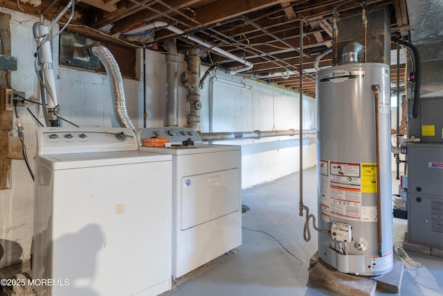 unfinished basement with gas water heater and independent washer and dryer