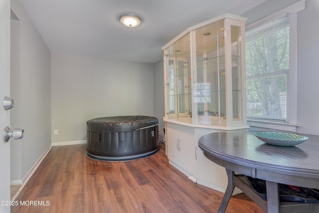 dining room with wood finished floors and baseboards