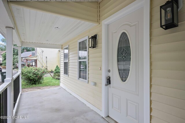 47 Imlaystown Rd, Cream Ridge, NJ 08514 - doorway to property featuring a porch