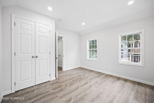 47 Imlaystown Rd, Cream Ridge, NJ 08514 - unfurnished bedroom featuring light wood-style floors, a closet, multiple windows, recessed lighting, and baseboards