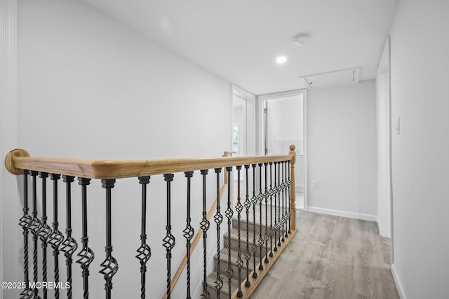 47 Imlaystown Rd, Cream Ridge, NJ 08514 - corridor with light wood finished floors, baseboards, an upstairs landing, and attic access