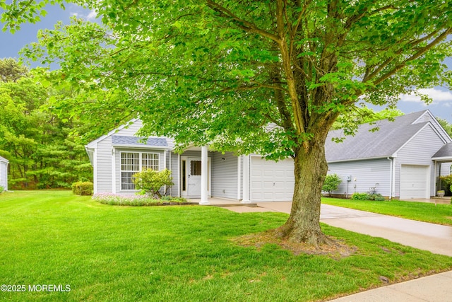 585 Waterford Dr, Manchester, NJ 08759 - view of front of home with a garage, driveway, and a front yard