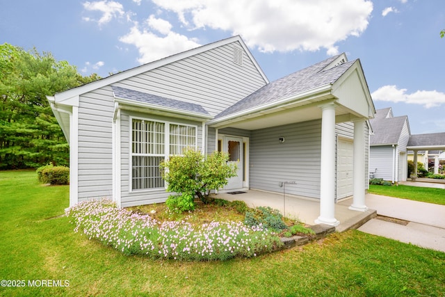 585 Waterford Dr, Manchester, NJ 08759 - view of front facade featuring a front yard, a garage, and a shingled roof