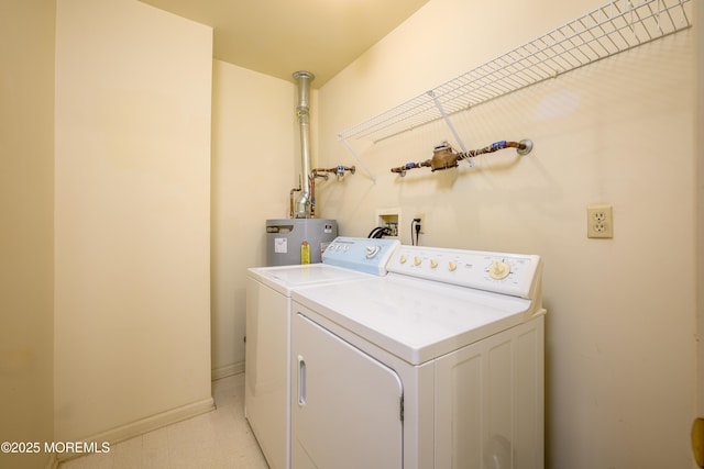 585 Waterford Dr, Manchester, NJ 08759 - laundry room with water heater, washing machine and clothes dryer, and baseboards