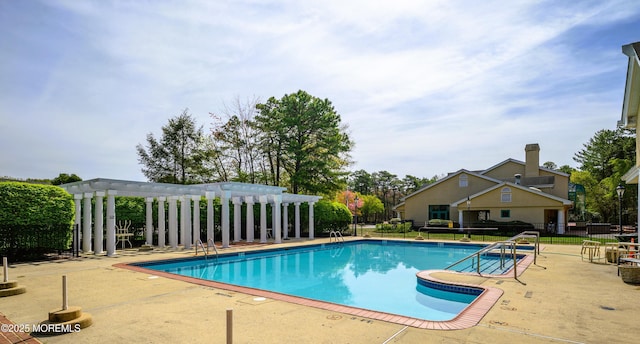 585 Waterford Dr, Manchester, NJ 08759 - community pool featuring a pergola, a patio area, and fence