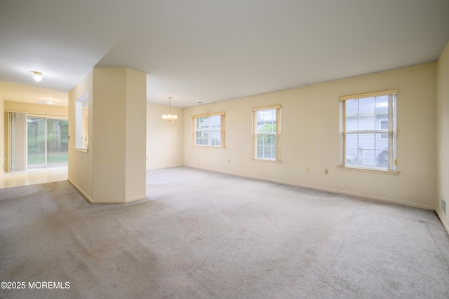 585 Waterford Dr, Manchester, NJ 08759 - spare room with a chandelier, baseboards, and carpet flooring