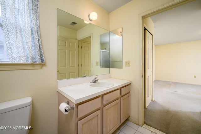 585 Waterford Dr, Manchester, NJ 08759 - bathroom with toilet, vanity, and tile patterned floors