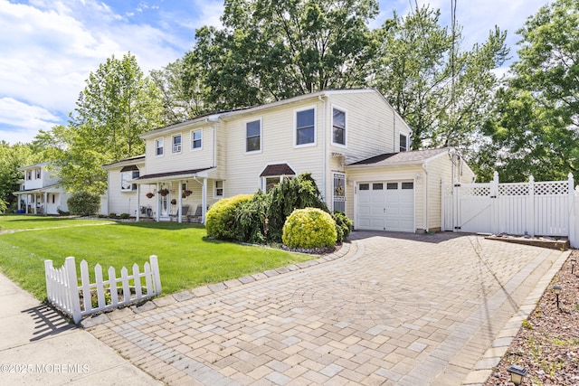 15 Creighton Cir, Old Bridge, NJ 08857 - view of front facade with decorative driveway, a gate, a garage, and covered porch