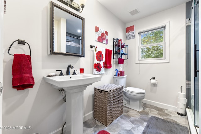 15 Creighton Cir, Old Bridge, NJ 08857 - full bath featuring toilet, baseboards, and stone finish flooring