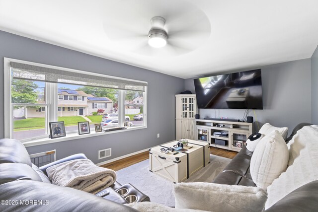15 Creighton Cir, Old Bridge, NJ 08857 - living room with ceiling fan, wood finished floors, and baseboards