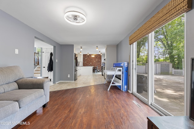 15 Creighton Cir, Old Bridge, NJ 08857 - living area featuring wood finished floors, healthy amount of natural light, and stairs