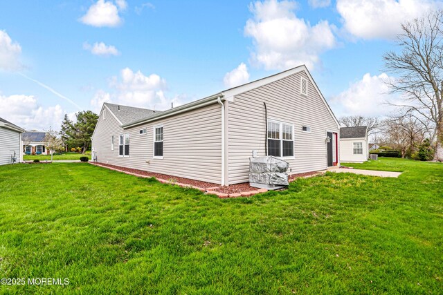 27 Gladstone Ave, Manchester, NJ 08759 - view of property exterior with a yard